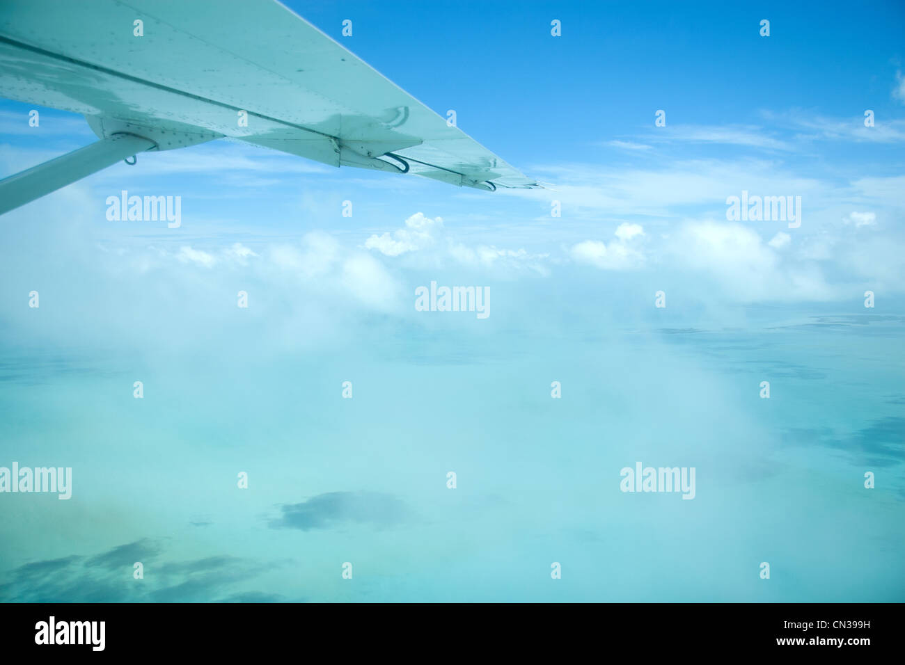 Airplane over the sea, Ambergris Caye, Belize Stock Photo