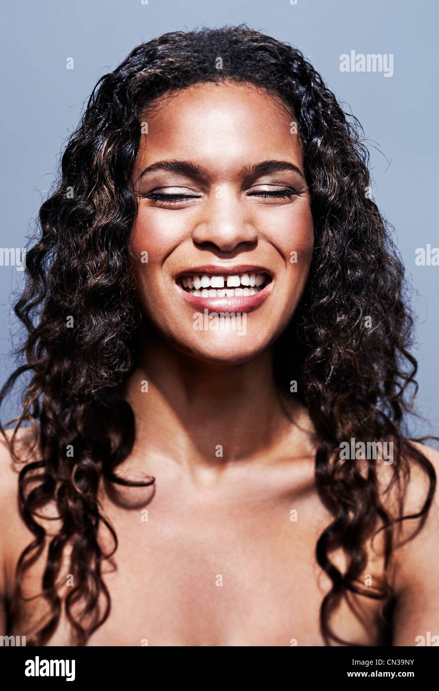 Happy woman with eyes closed Stock Photo - Alamy