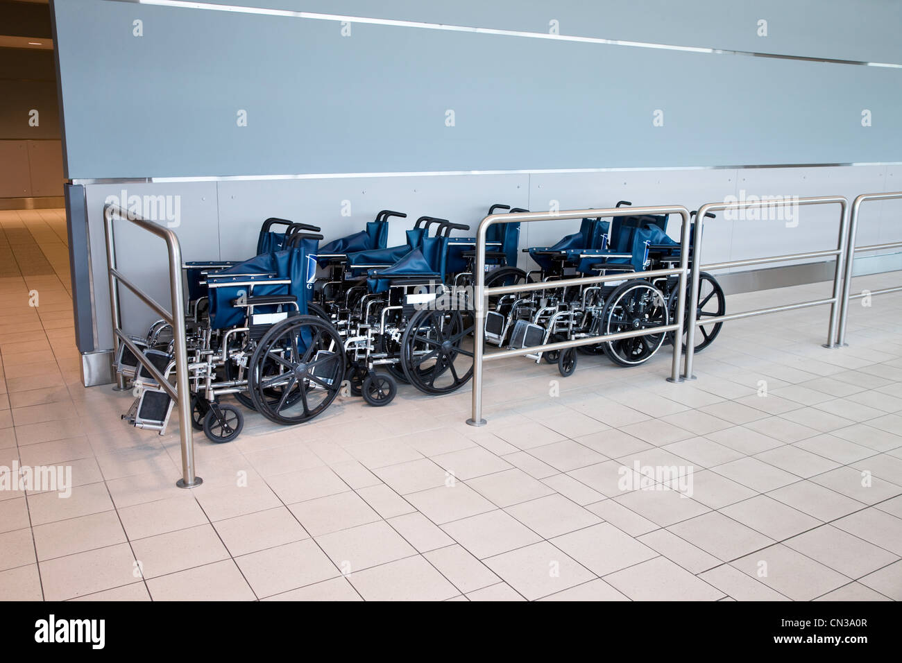 Wheelchairs at airport Stock Photo Alamy