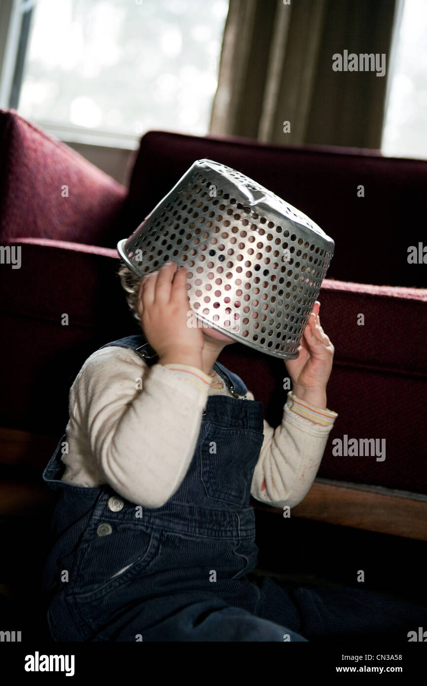 Boy with colander on head Stock Photo Alamy