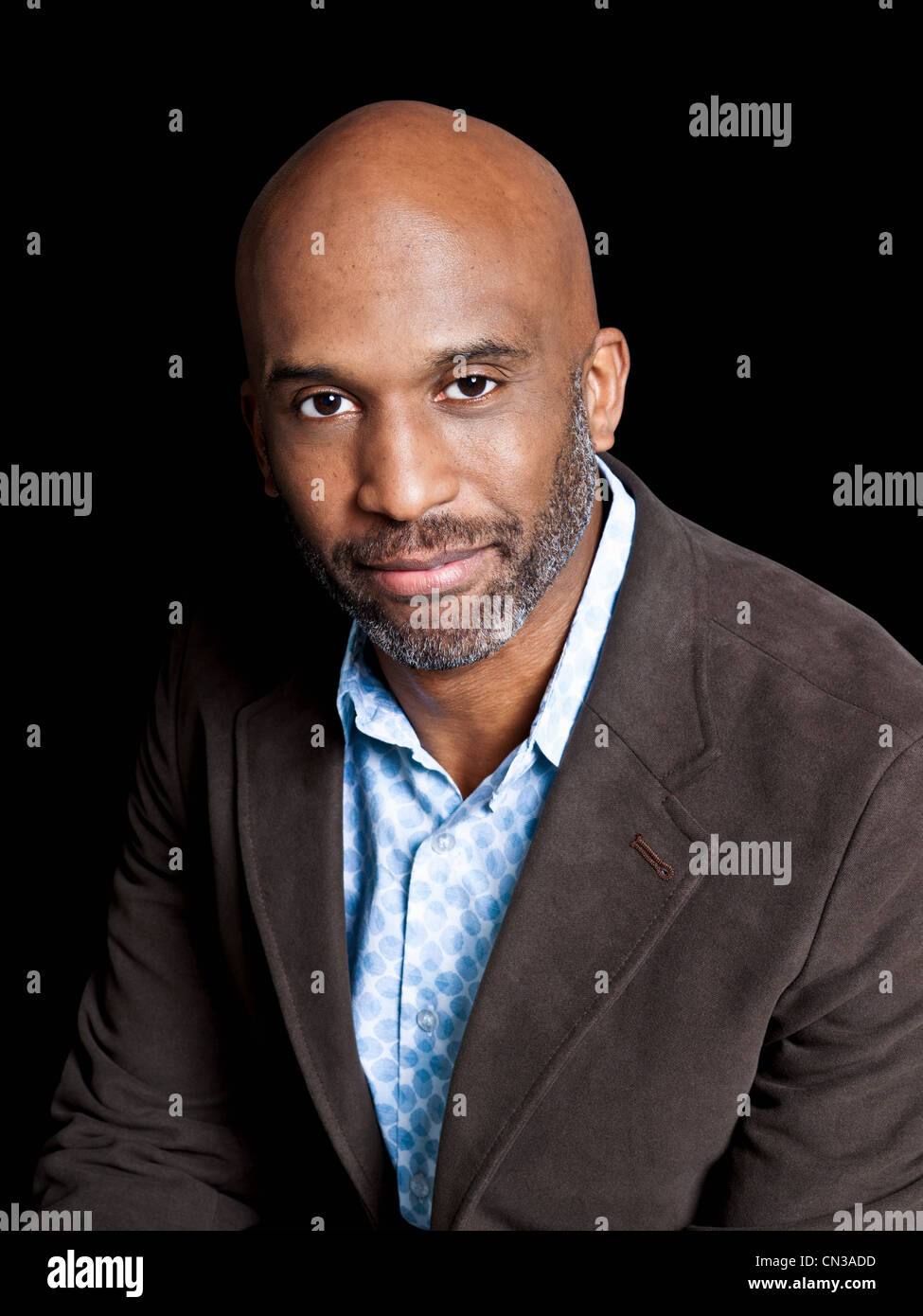 Man wearing brown jacket, portrait Stock Photo