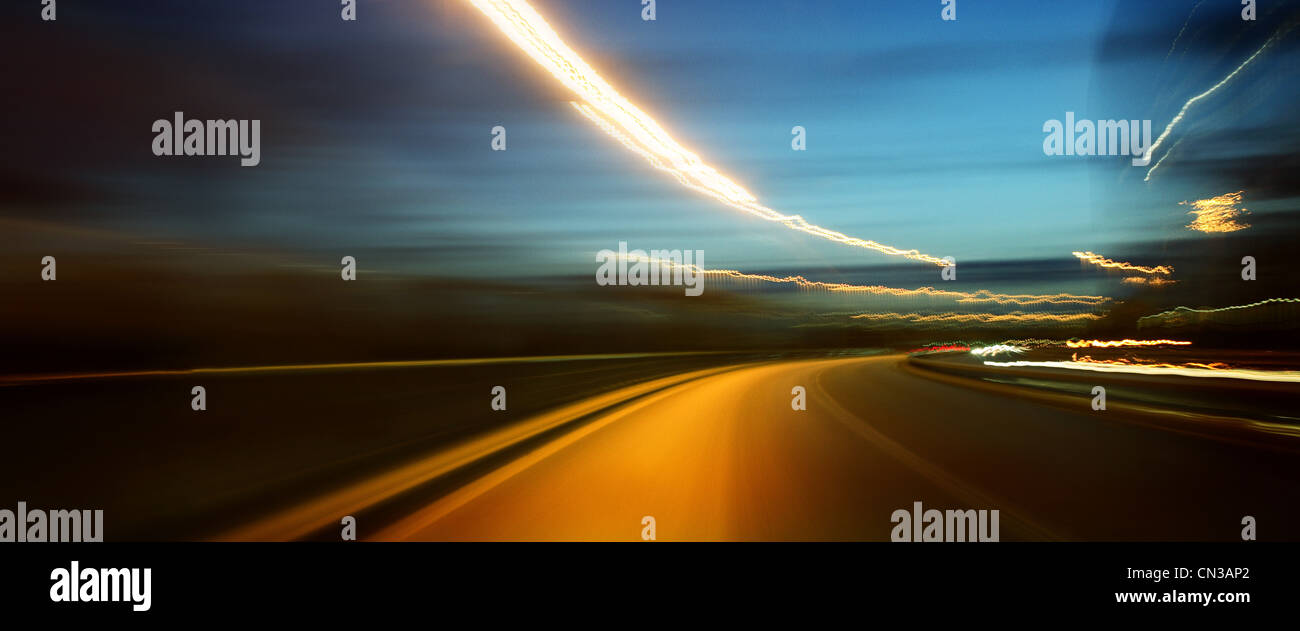 Road at night, blurred motion Stock Photo