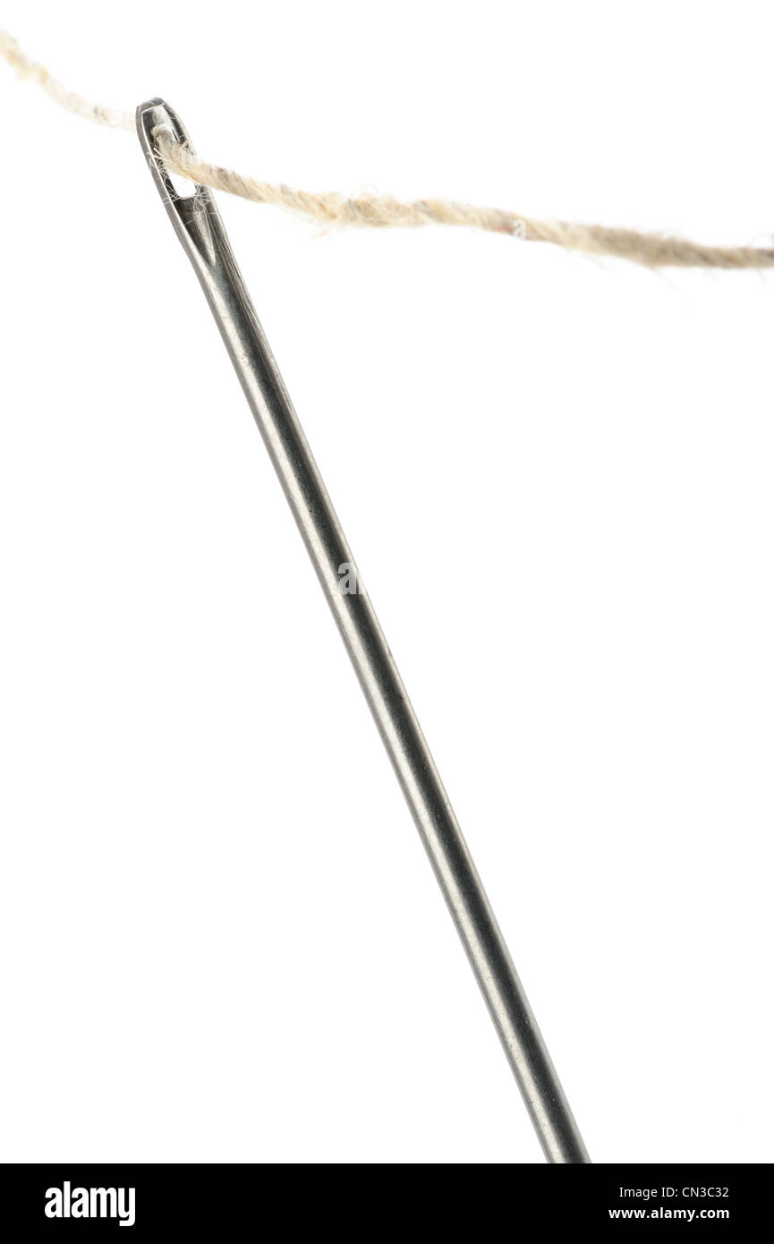 Needle and thread closeup. Isolated on white background Stock Photo Alamy