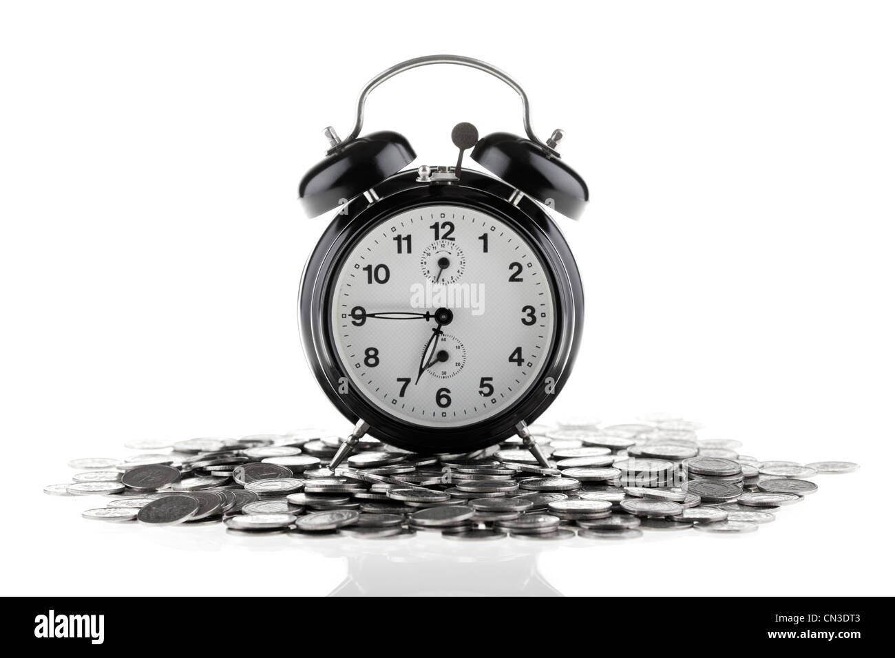 Beautiful old clock staying on one polish zloty coins. Time is money