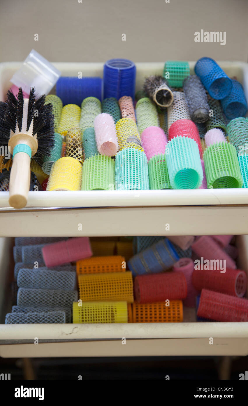 Bright Plastic Hairdressing curlers in Tray Stock Photo