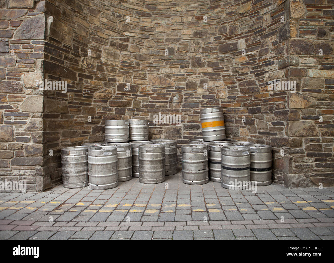Pile of empty kegs outside a bar Stock Photo Alamy