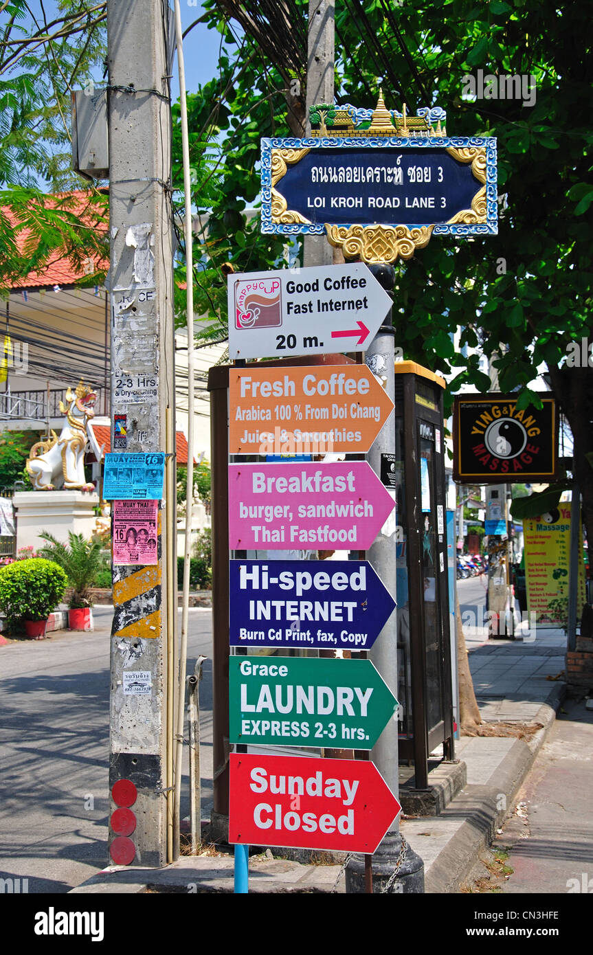 Advertising signs on lamp post, Loi Kroh Road, Mueang Chiang Mai