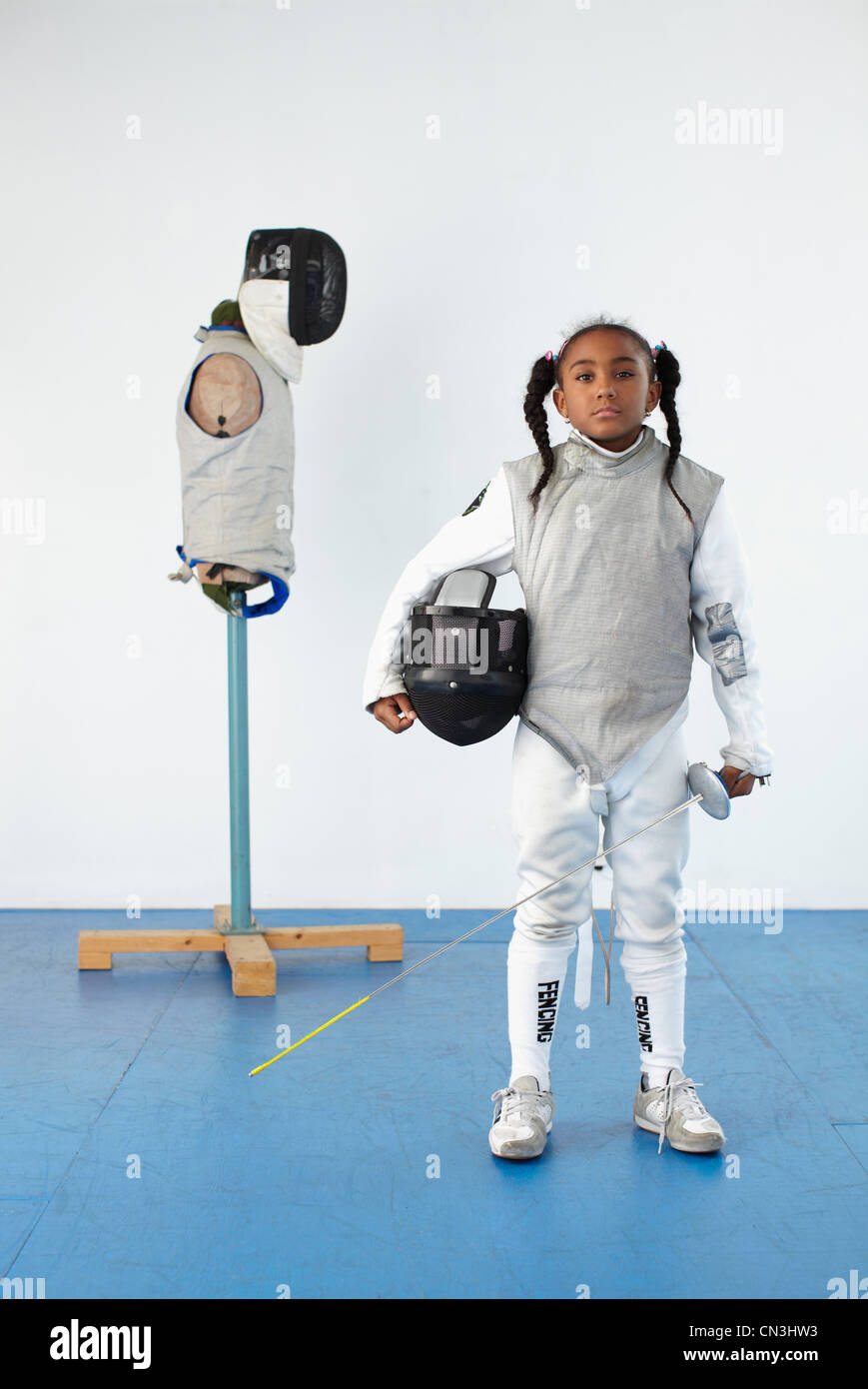 Portrait of girl in fencing gear Stock Photo