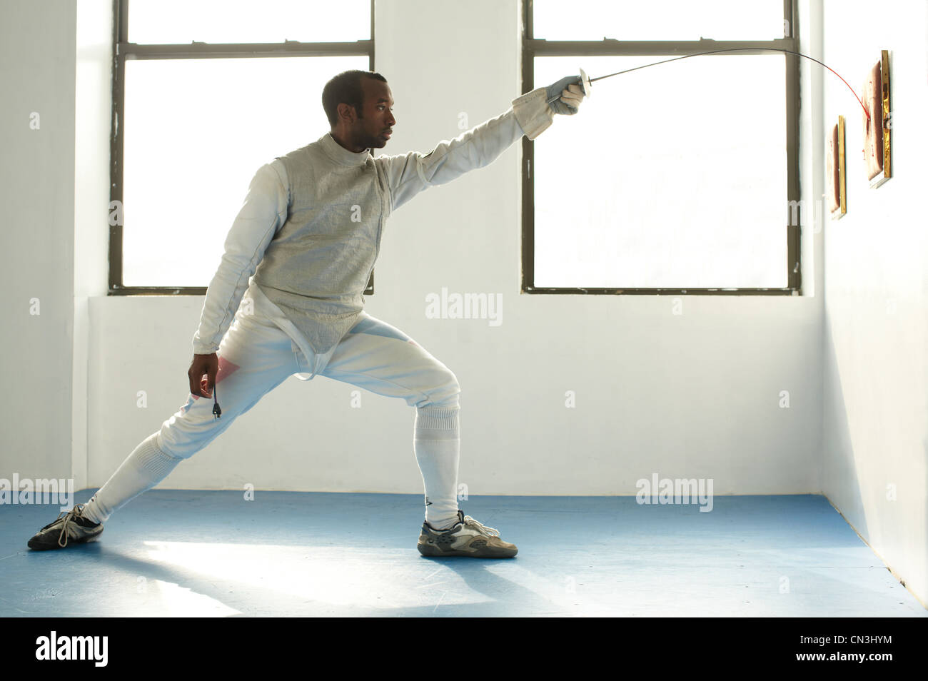 Male fencer holding foil target hires stock photography and images Alamy