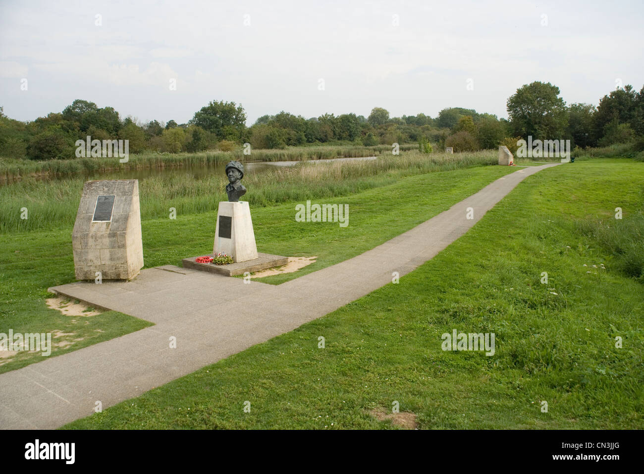 Statue of Major John Howard at Pegasus Bridge and blocks marking the