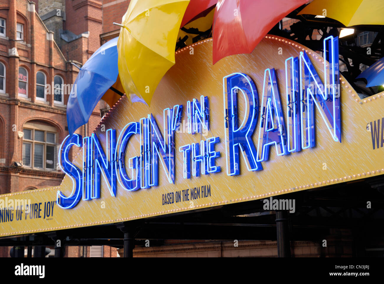 Sign promoting the musical Singin' in the Rain outside the Palace Theatre, London, UK Stock Photo
