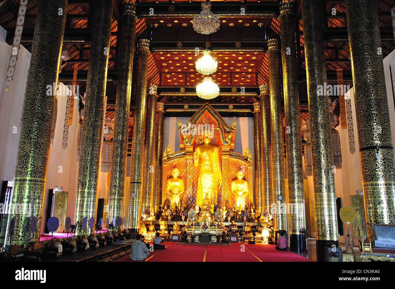 Golden Buddha in temple interior, Wat Chedi Luang, Chiang Mai, Chiang Mai Province, Thailand Stock Photo