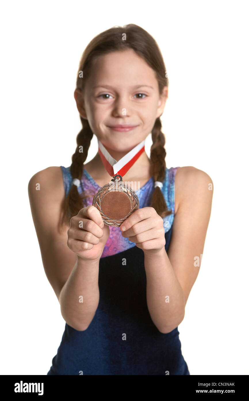 Girl in Gymnastic Clothes Holding Medal Stock Photo Alamy