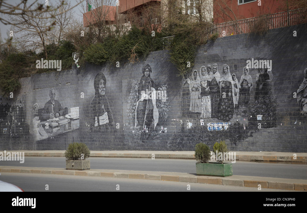 Paintings on the walls   of important events and personalities in Suleimaniya .  Iraqi Kurdistan Stock Photo