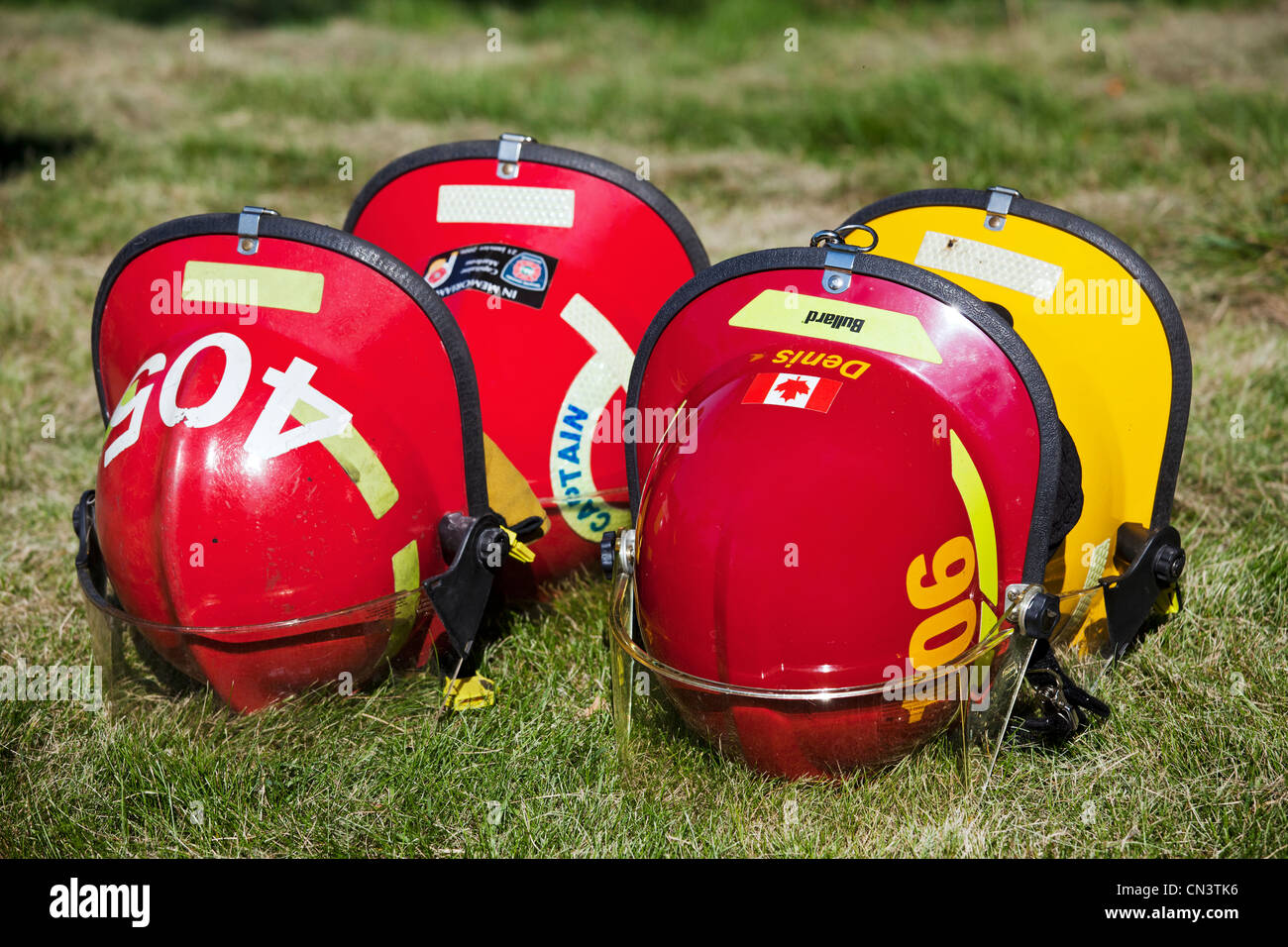 Canada, Quebec Province, Montreal, NASCAR race at the Circuit Gilles Villeneuve on Ile Notre Dame, firemen helmets Stock Photo
