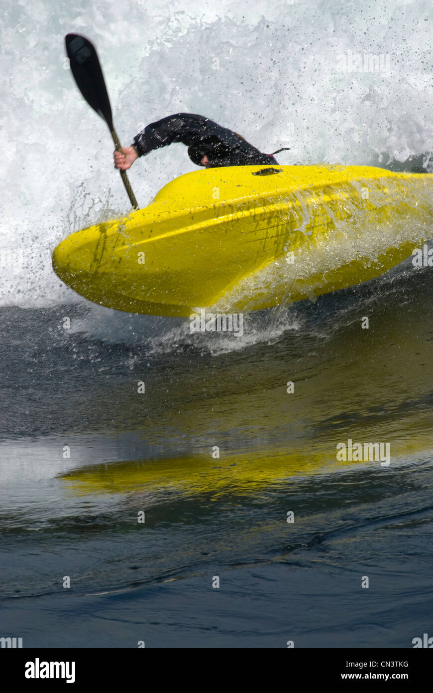 Kayaker plays in the standing waves in Skookumchuck Narrows, Sechelt Inlet, British Columbia Stock Photo