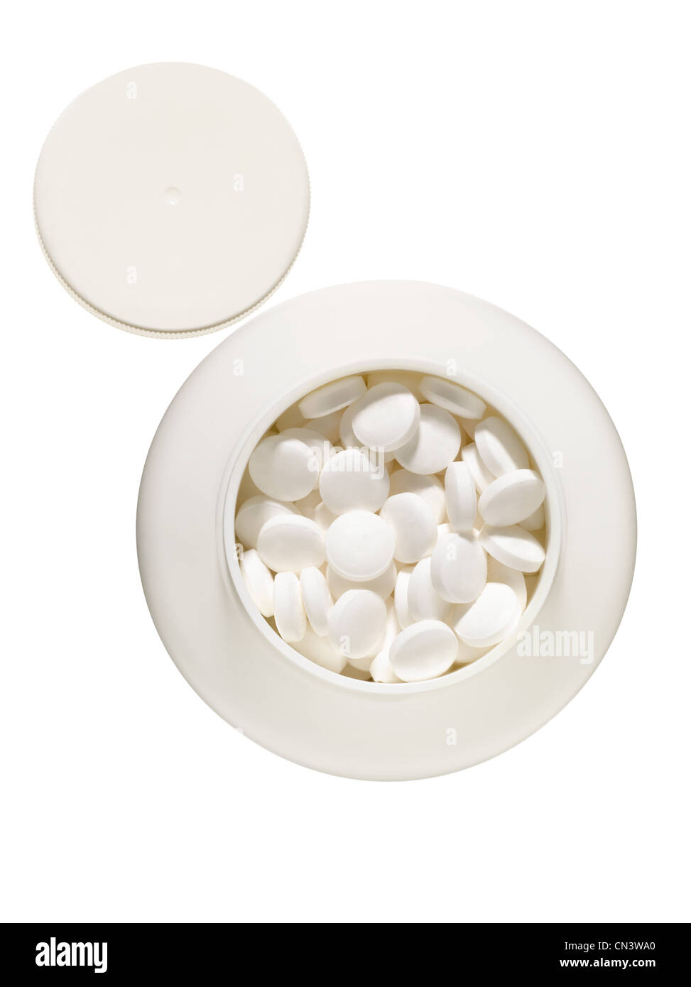 White pills in container Stock Photo