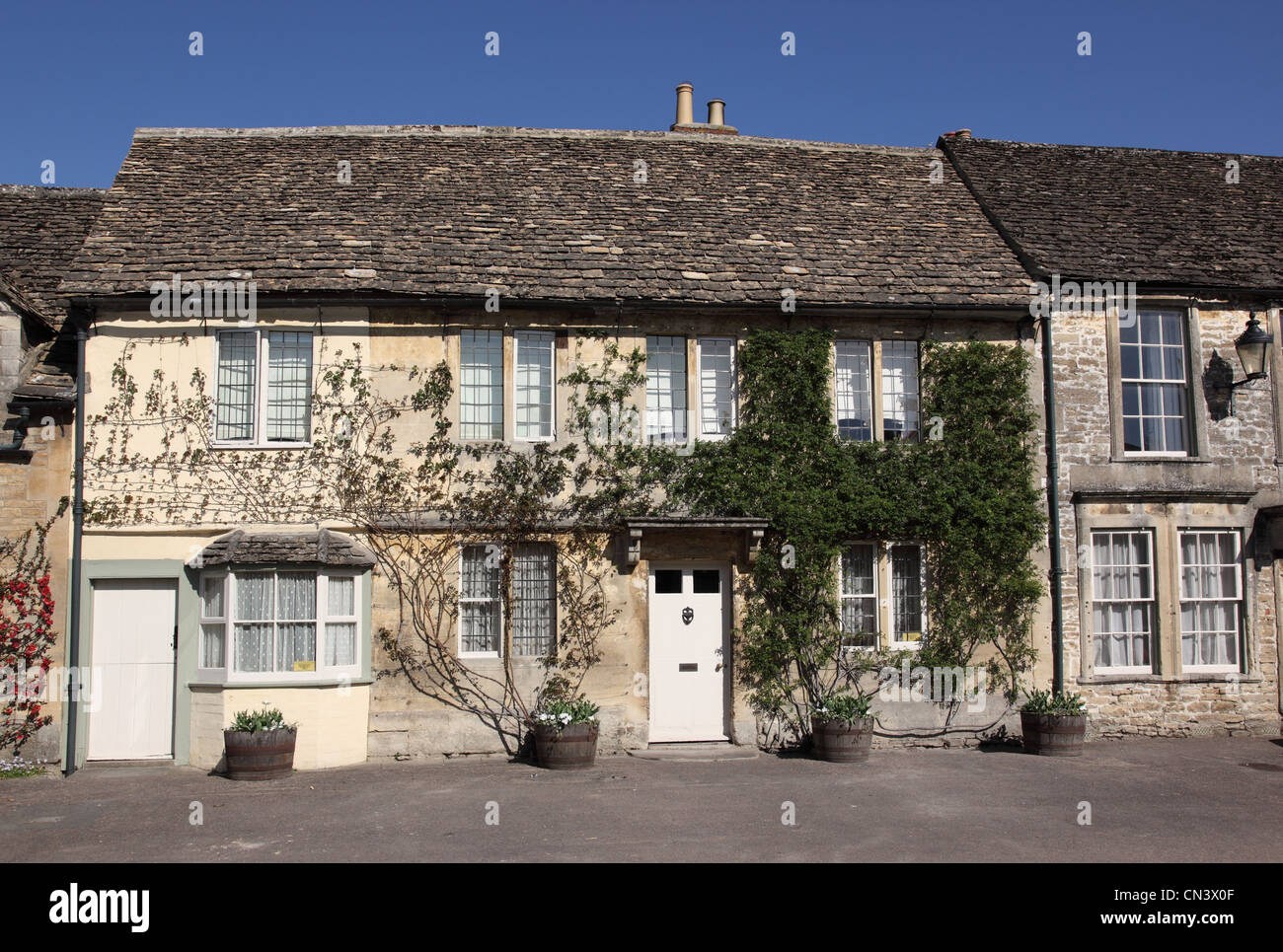 Houses in Lacock village High Street, Wiltshire, England, UK Stock Photo