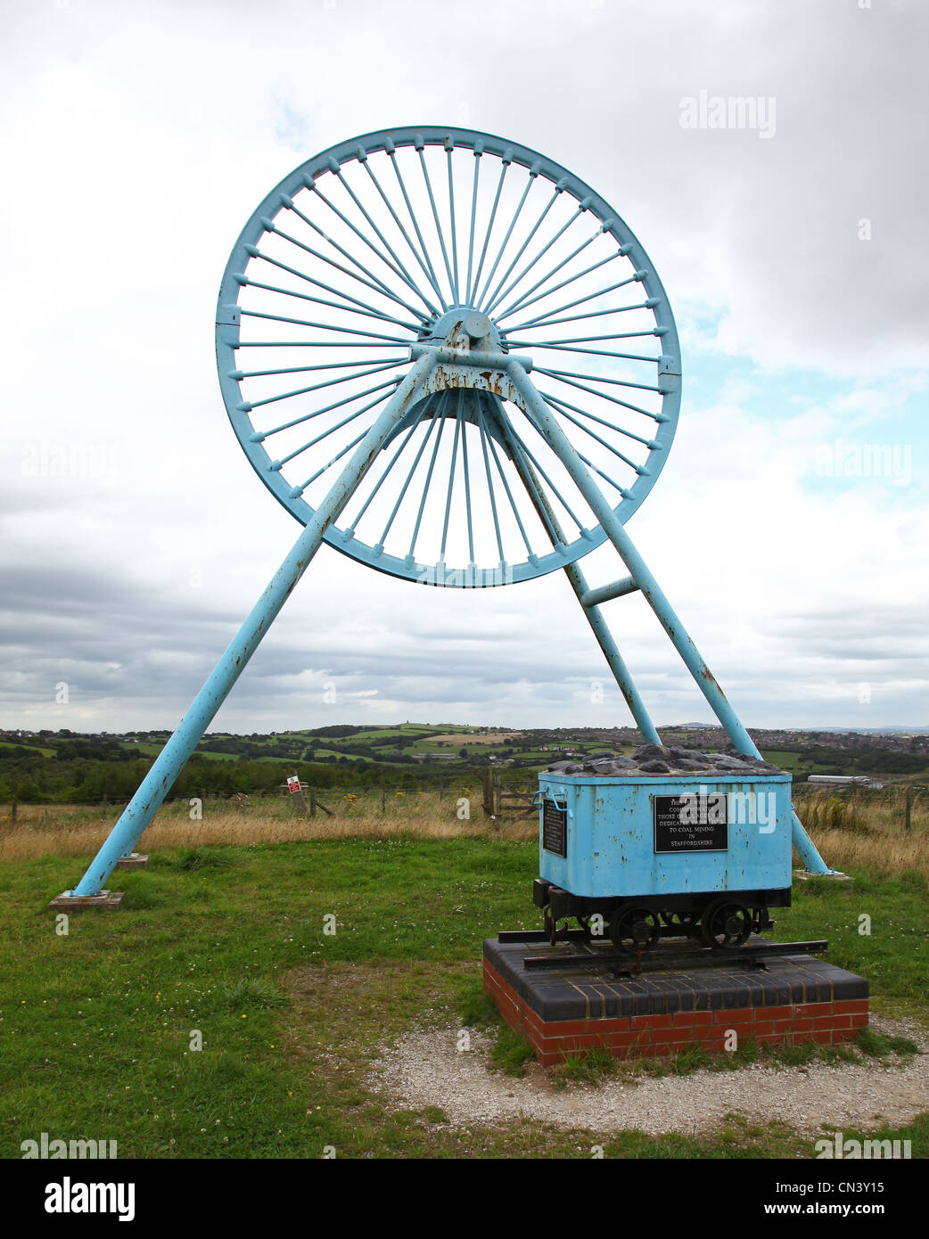 Pit wheel and coal truck commemorating coal mining at former open cast
