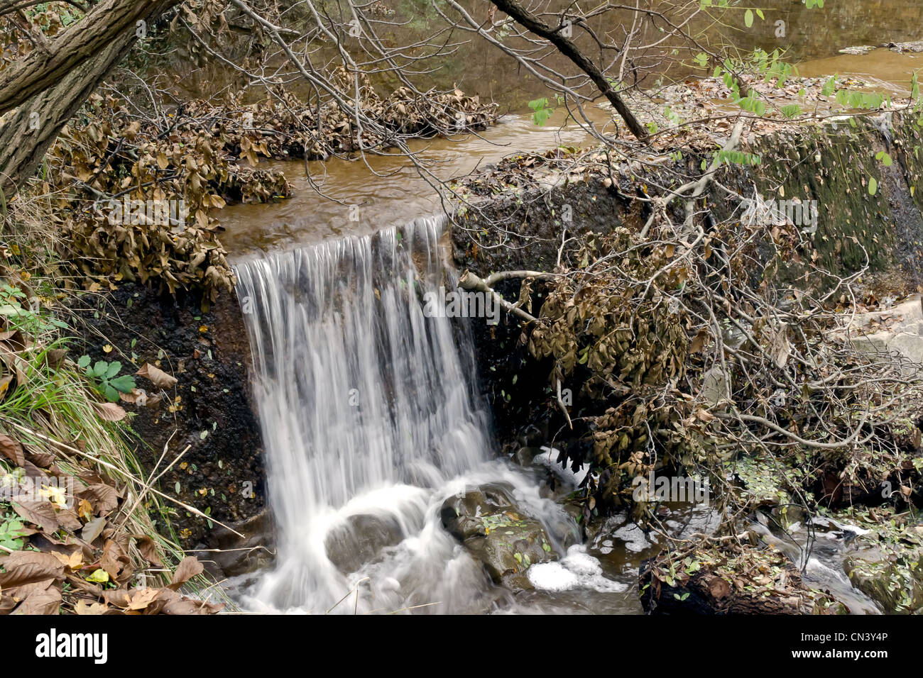 Artificial waterfall on the river Stock Photo