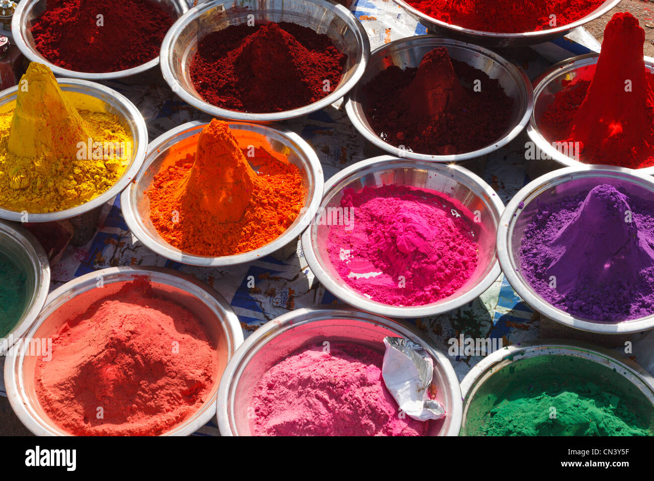 Colored colorful powder kumkum on Indian bazaar for holi festival celebration Stock Photo