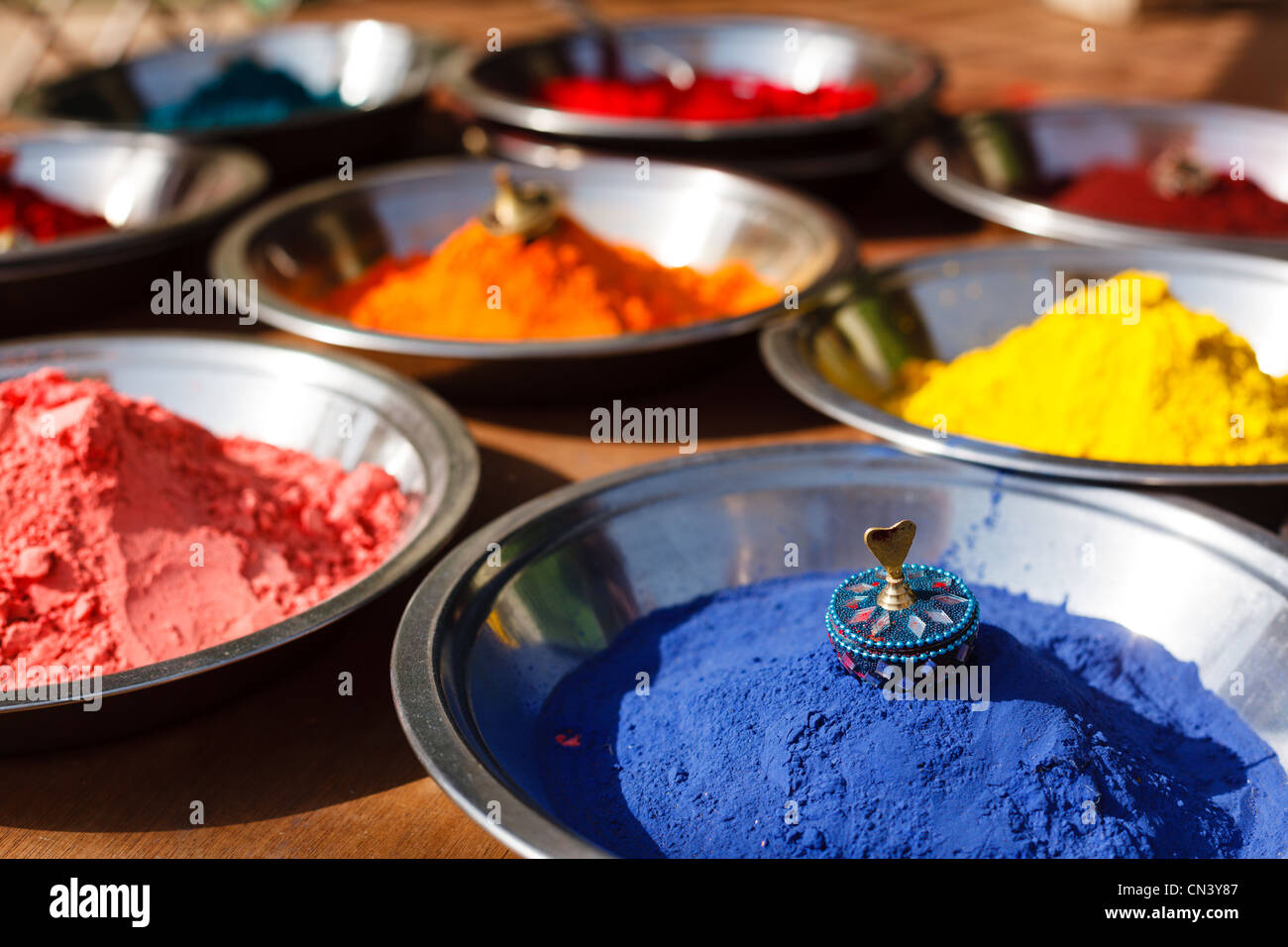 Colored colorful powder kumkum on Indian bazaar for holi festival celebration Stock Photo