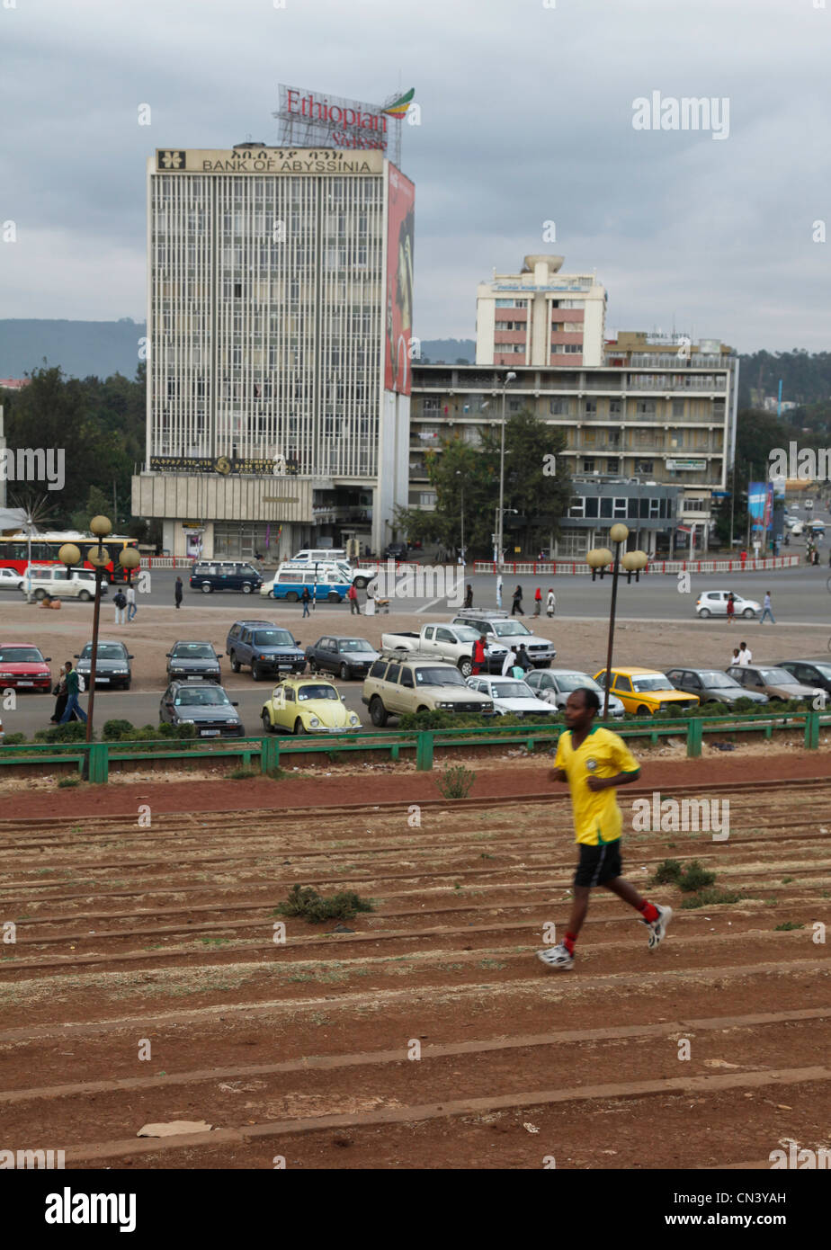Man running and training for marathon in Meskal Square, Addis Ababa