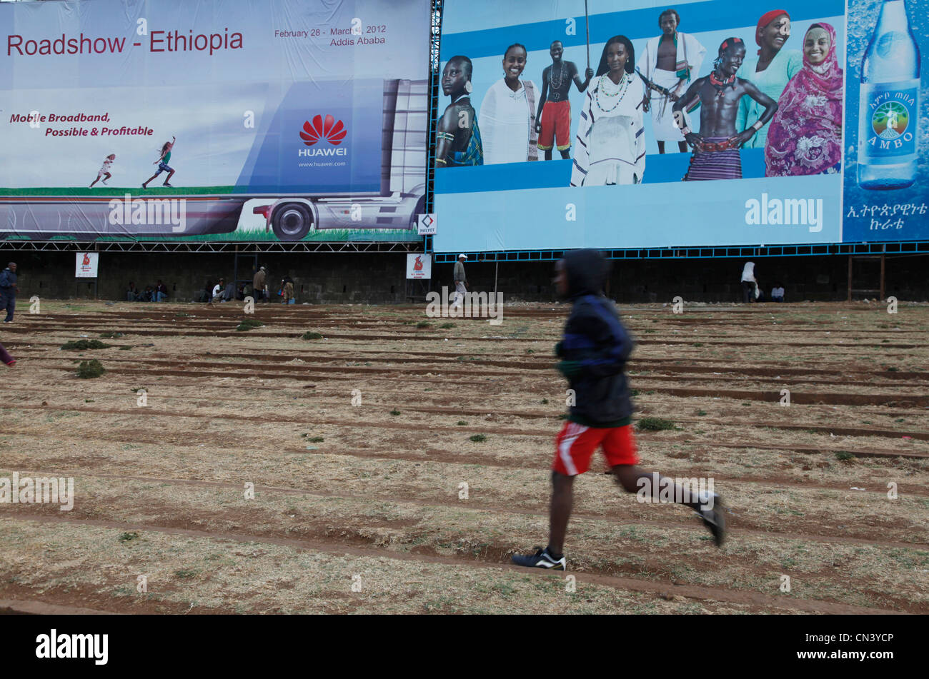 People running and training for marathon in Meskal Square, Addis Ababa