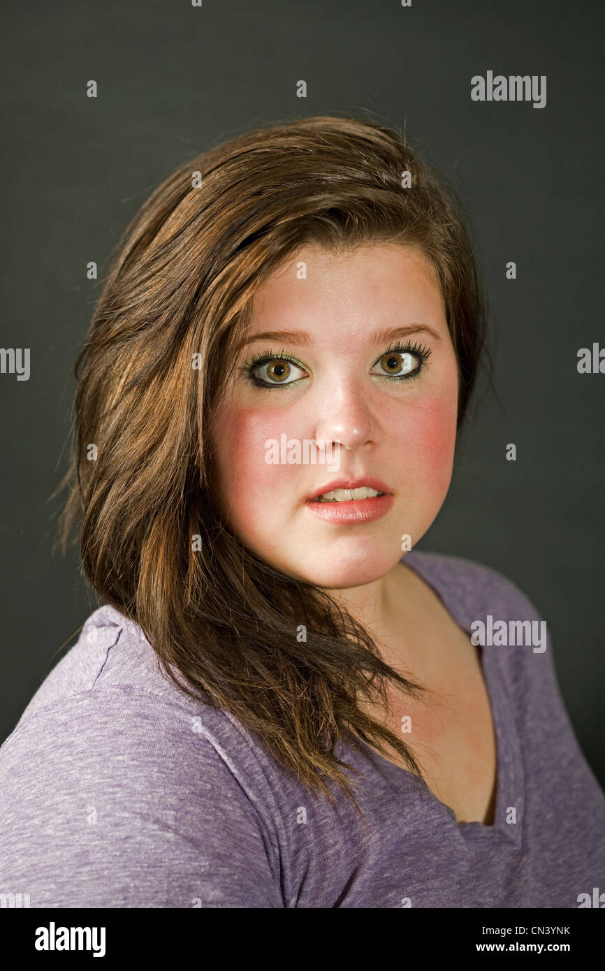 A pretty young woman smiling at the camera Stock Photo - Alamy