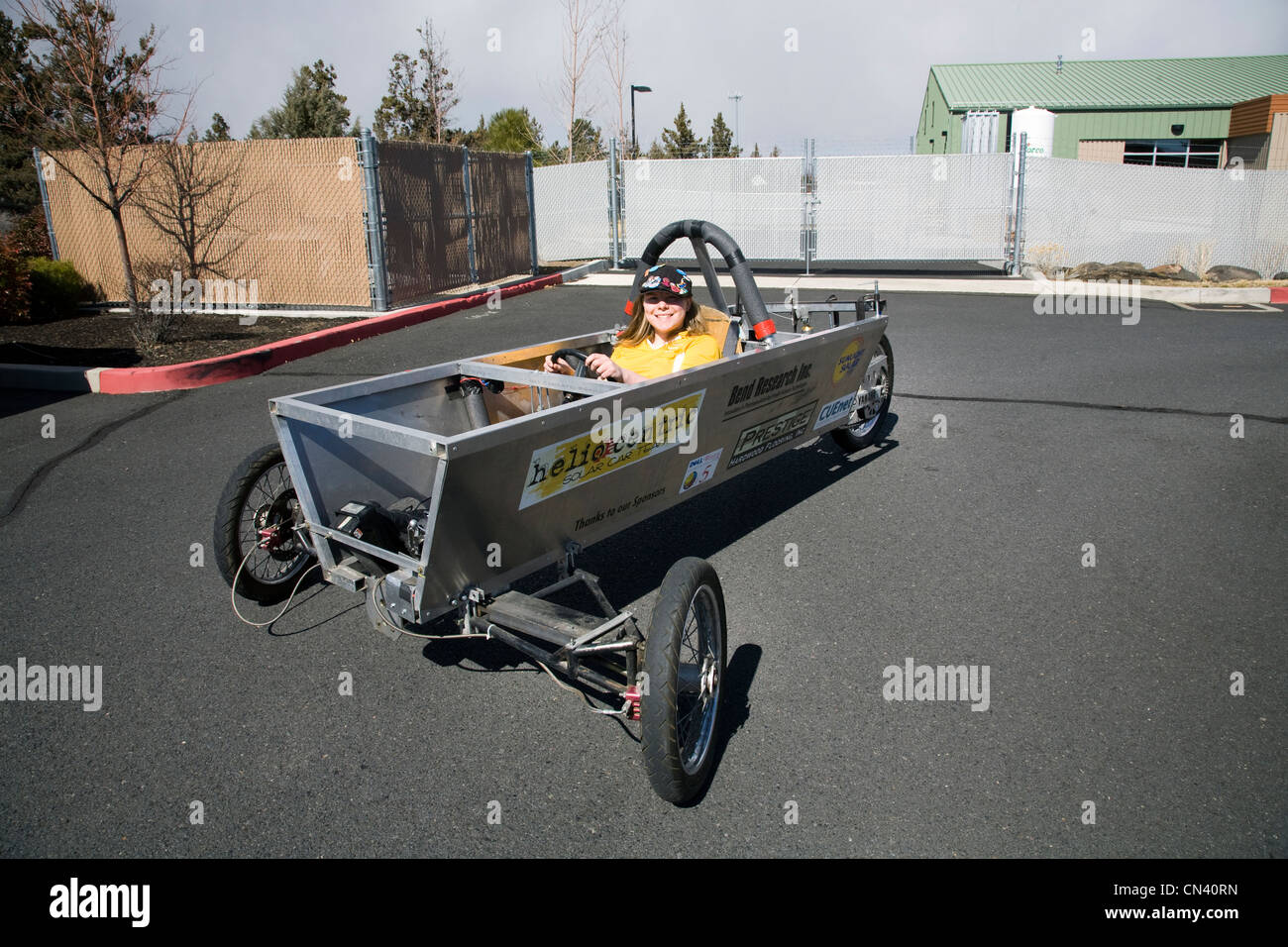 A member of the Heliocentric Electric Car team drives an experimental