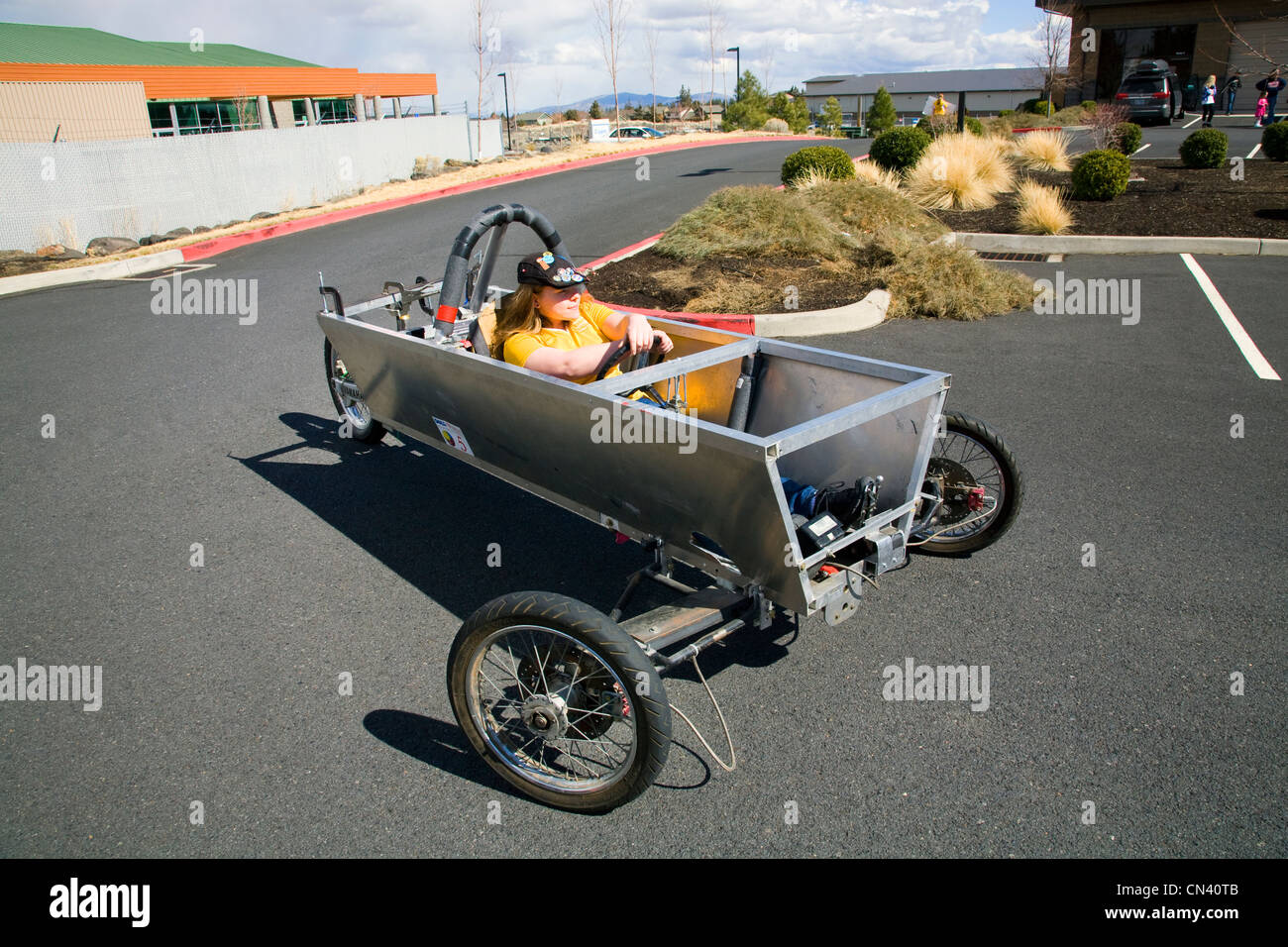 A member of the Heliocentric Electric Car team drives an experimental