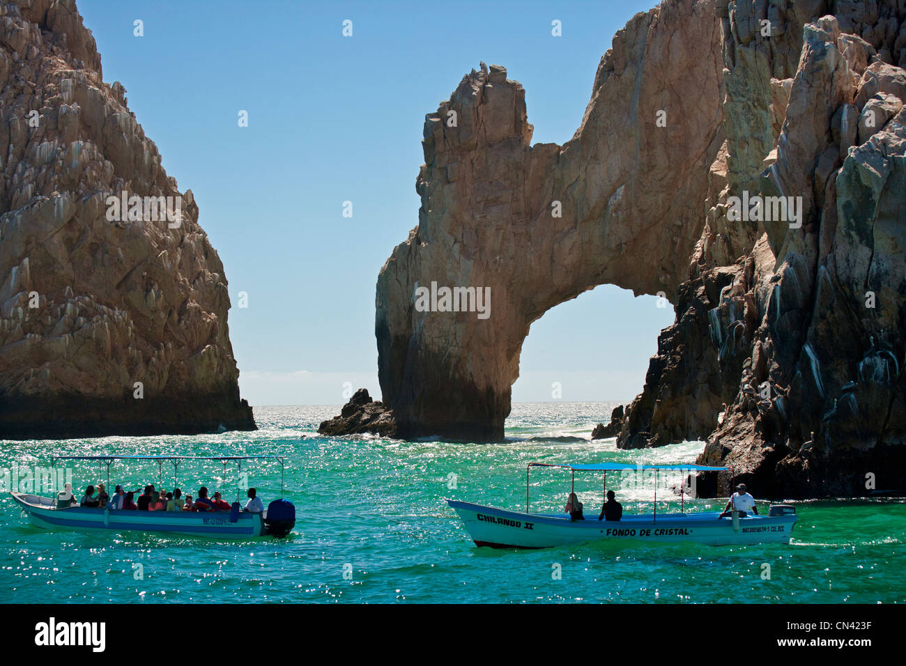 Los Arcos arch and tourboats along Coastline of Cabo San Lucas in Sea of Cortez- Cabo San Lucas-Mexico. Stock Photo