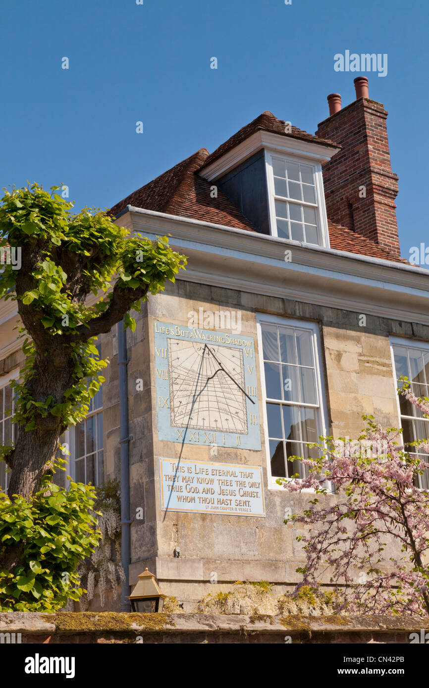 Vertical Sundial on a house in The Close, Salisbury, Wiltshire. Stock Photo