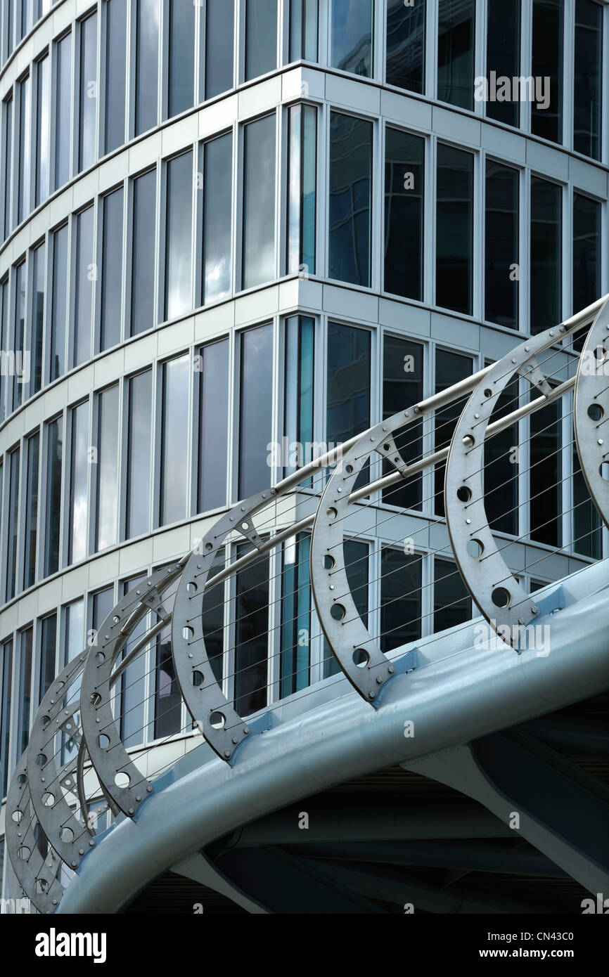 An abstract view of Valentine's Bridge with an office building in the background. Temple Quay, Bristol, UK. Stock Photo
