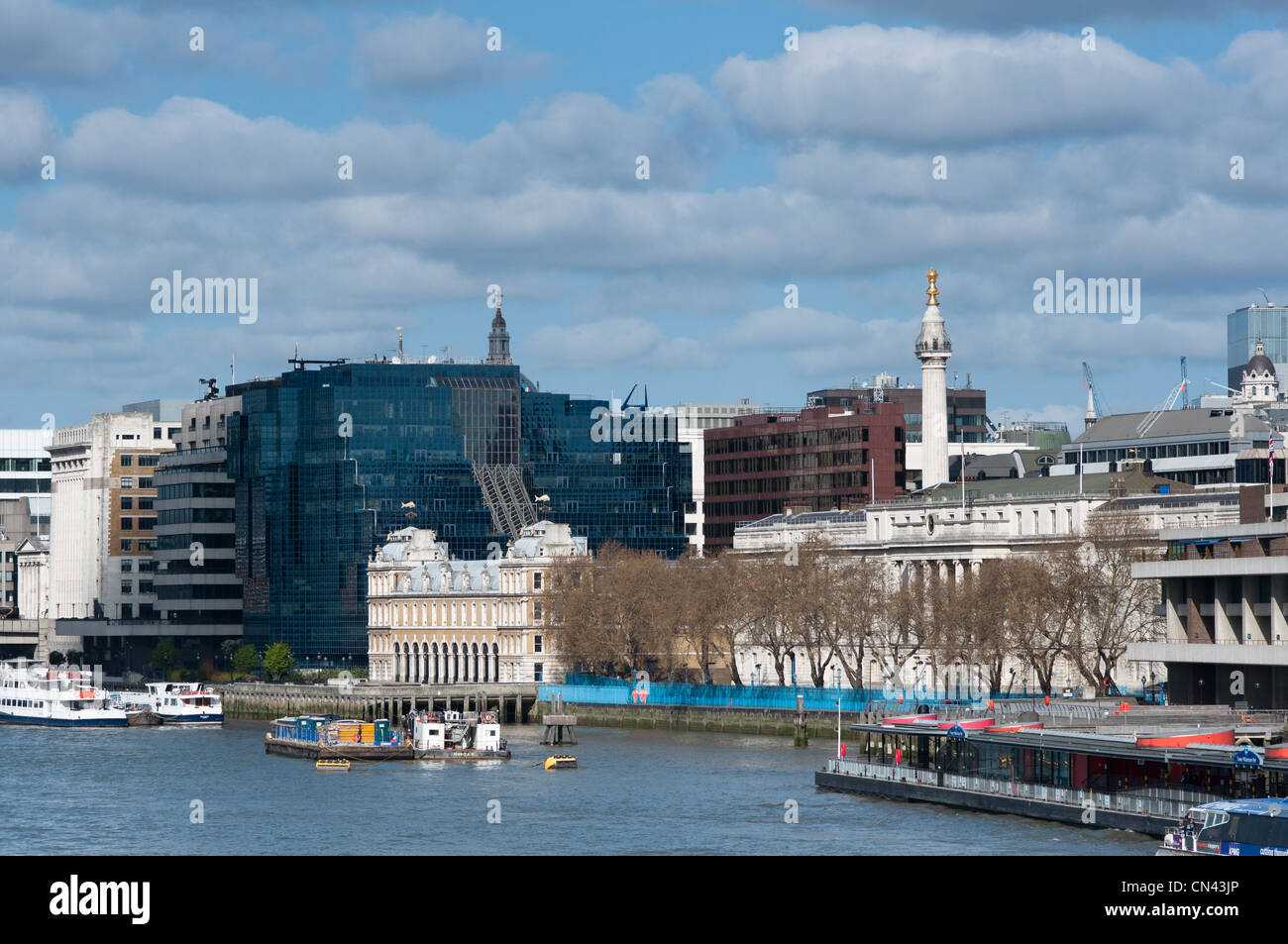 The north bank of the river Thames near the City of London. View from Tower Bridge. Stock Photo