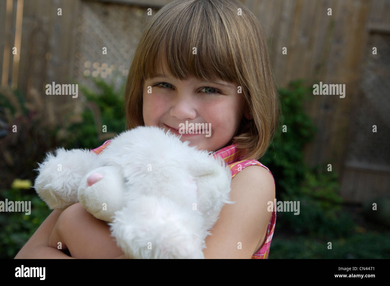Girl Holding Teddy Bear Stock Photo - Alamy