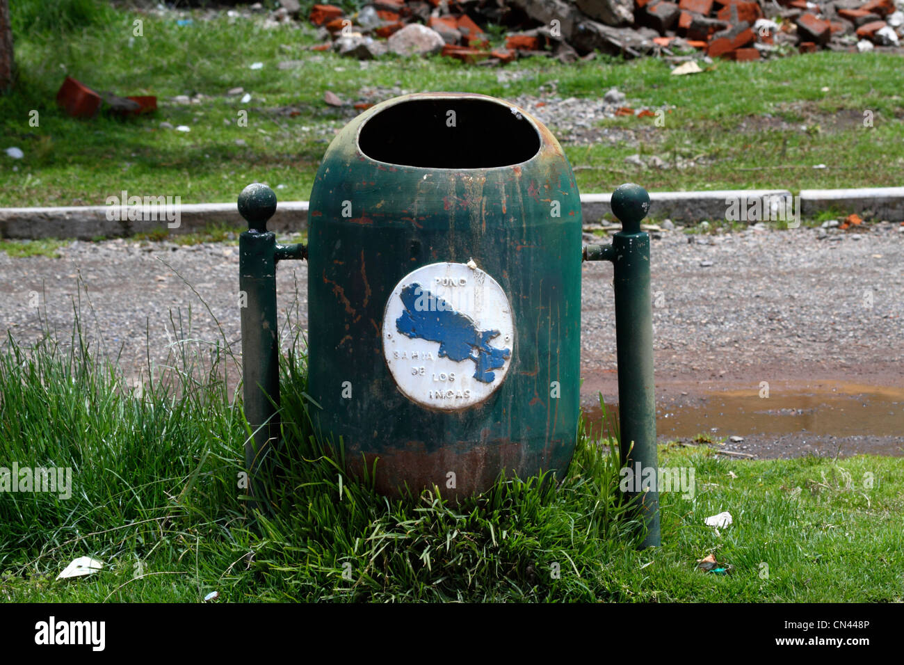 Rubbish bin with simple map / outline of Lake Titicaca painted on it, part of a campaign to keep the Lake clean and unpolluted, Puno, Peru Stock Photo