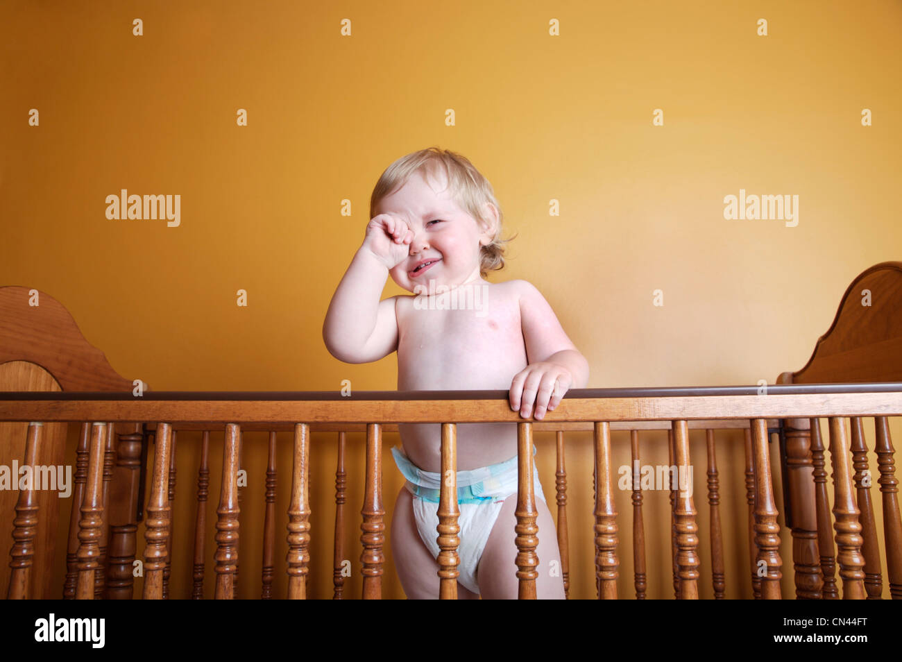Boy In Diapers Crying In Crib Stock Photo 47419900 Alamy