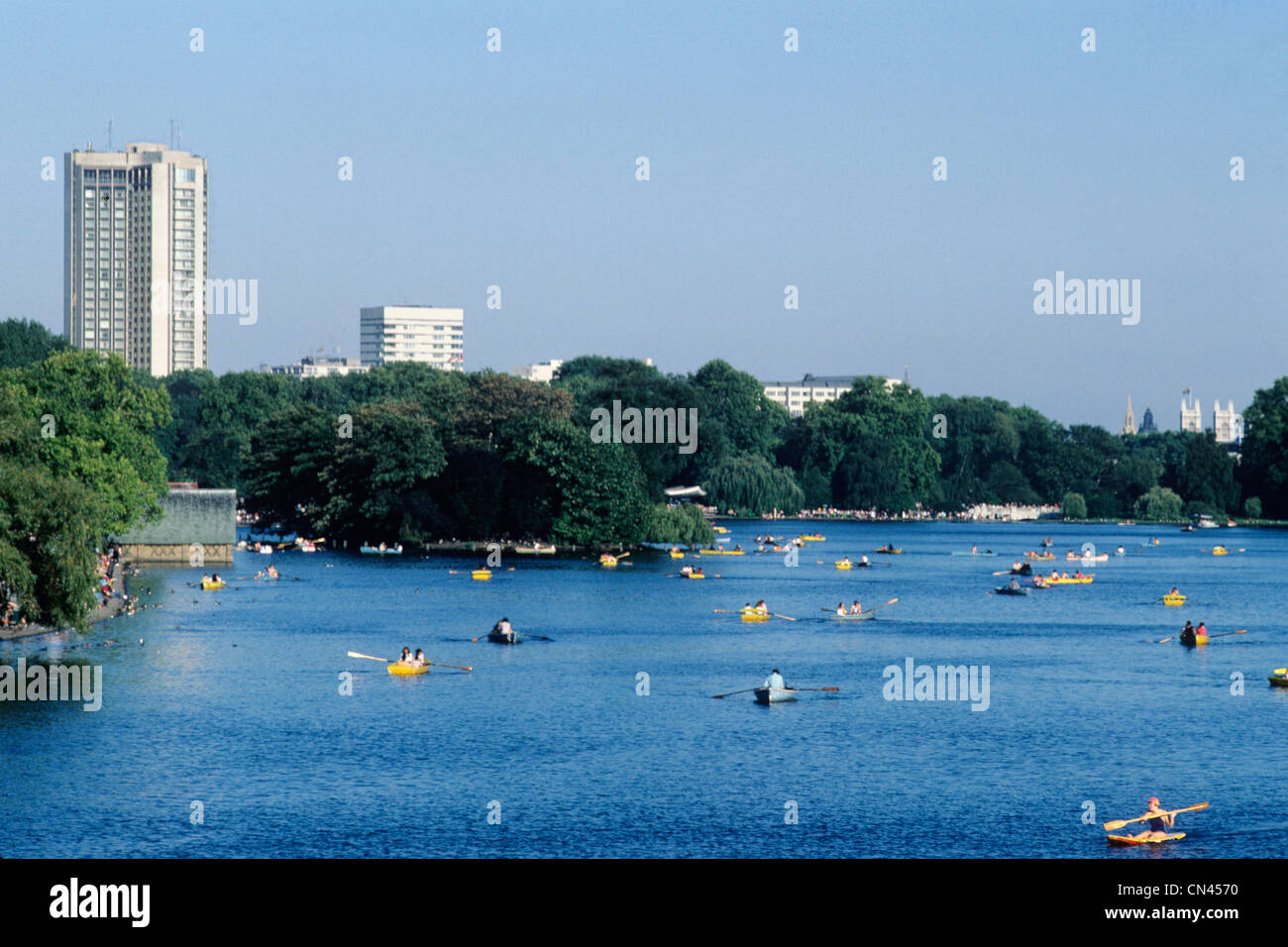 The Serpentine, London, rowings boats, Hilton Hotel England UK Hyde Park Enlish parks lake lakes Stock Photo