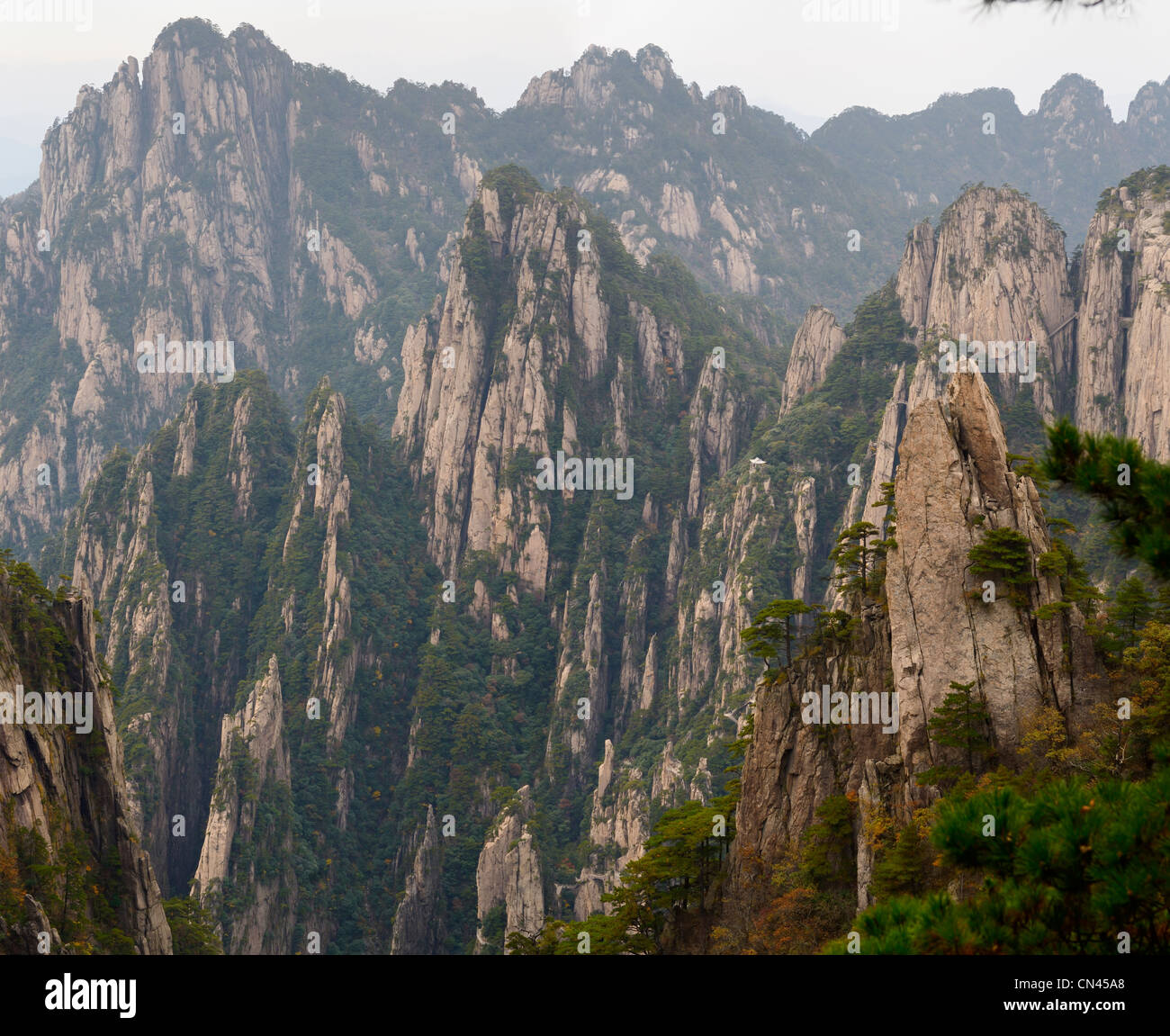 Walkways and Pagoda on Songling Peak at the West Sea area Huangshan Yellow Mountain China Stock Photo