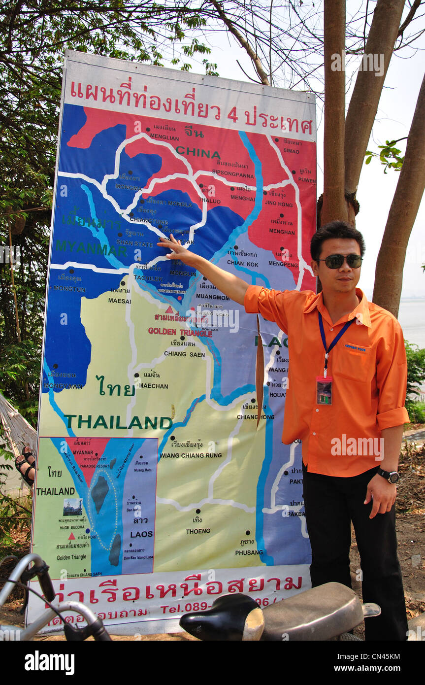 Local guide explaining map at river crossing to Laos, The Golden Triangle, Chiang Saen District, Chiang Rai Province, Thailand Stock Photo