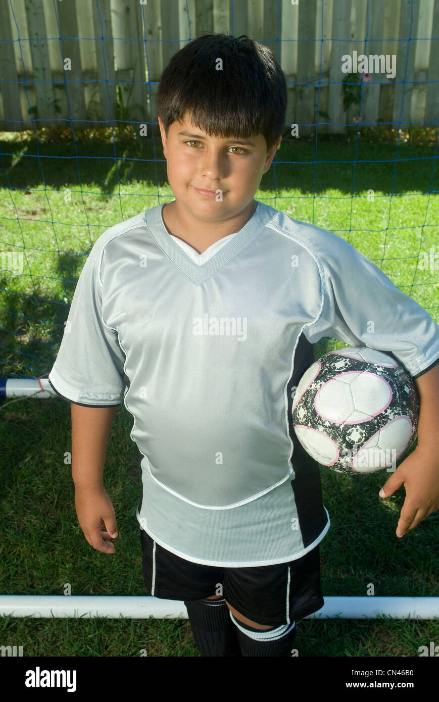 Portrait of a Young Boy in Uniform with a Soccer Ball, Montreal, Quebec Stock Photo Alamy