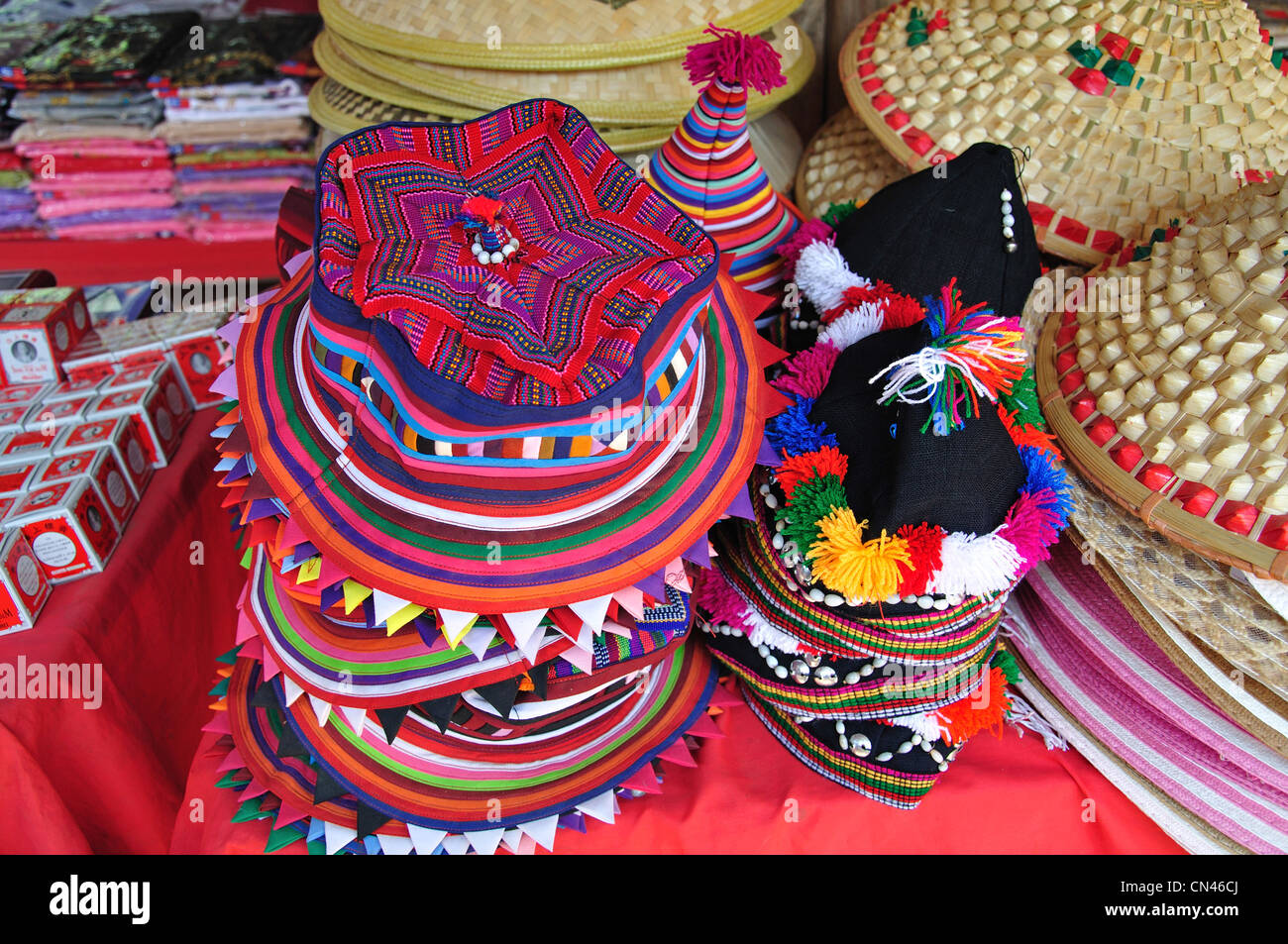 Hill tribe hats in tourist market, Don Sae, Pak Tha Region, Bokèo Province, Laos Stock Photo