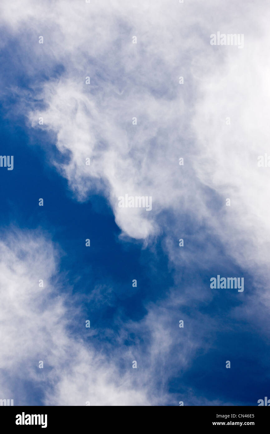 White cirrus clouds against a cobalt blue Colorado sky Stock Photo