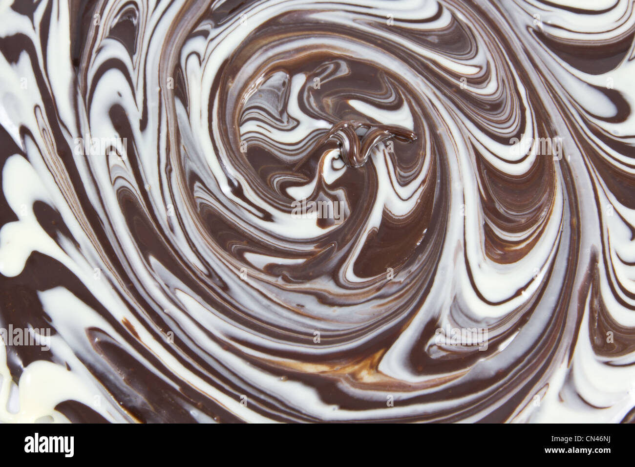 Picture of white and black chocolate mixed together forming a texture