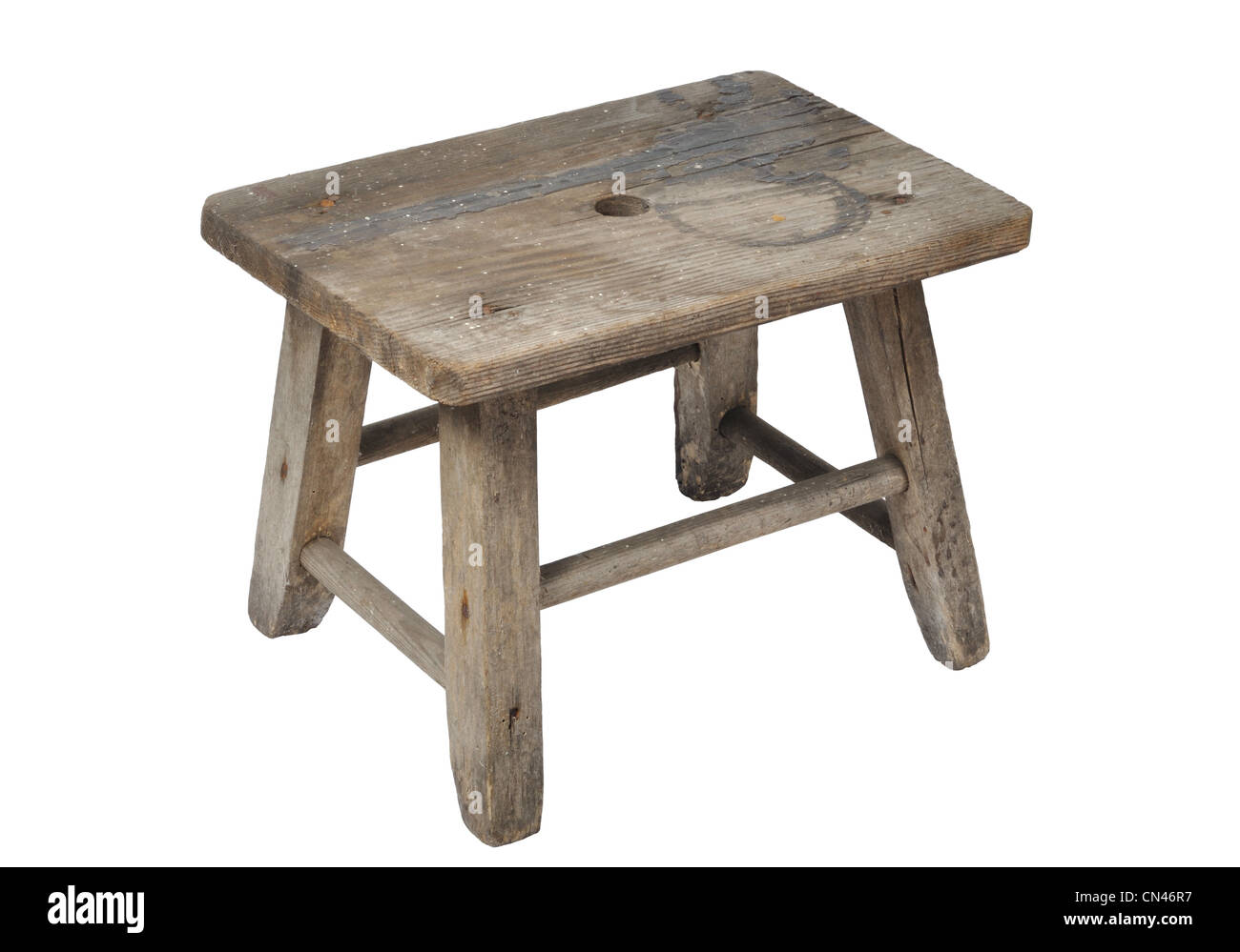 Old wooden stool isolated on white background Stock Photo - Alamy