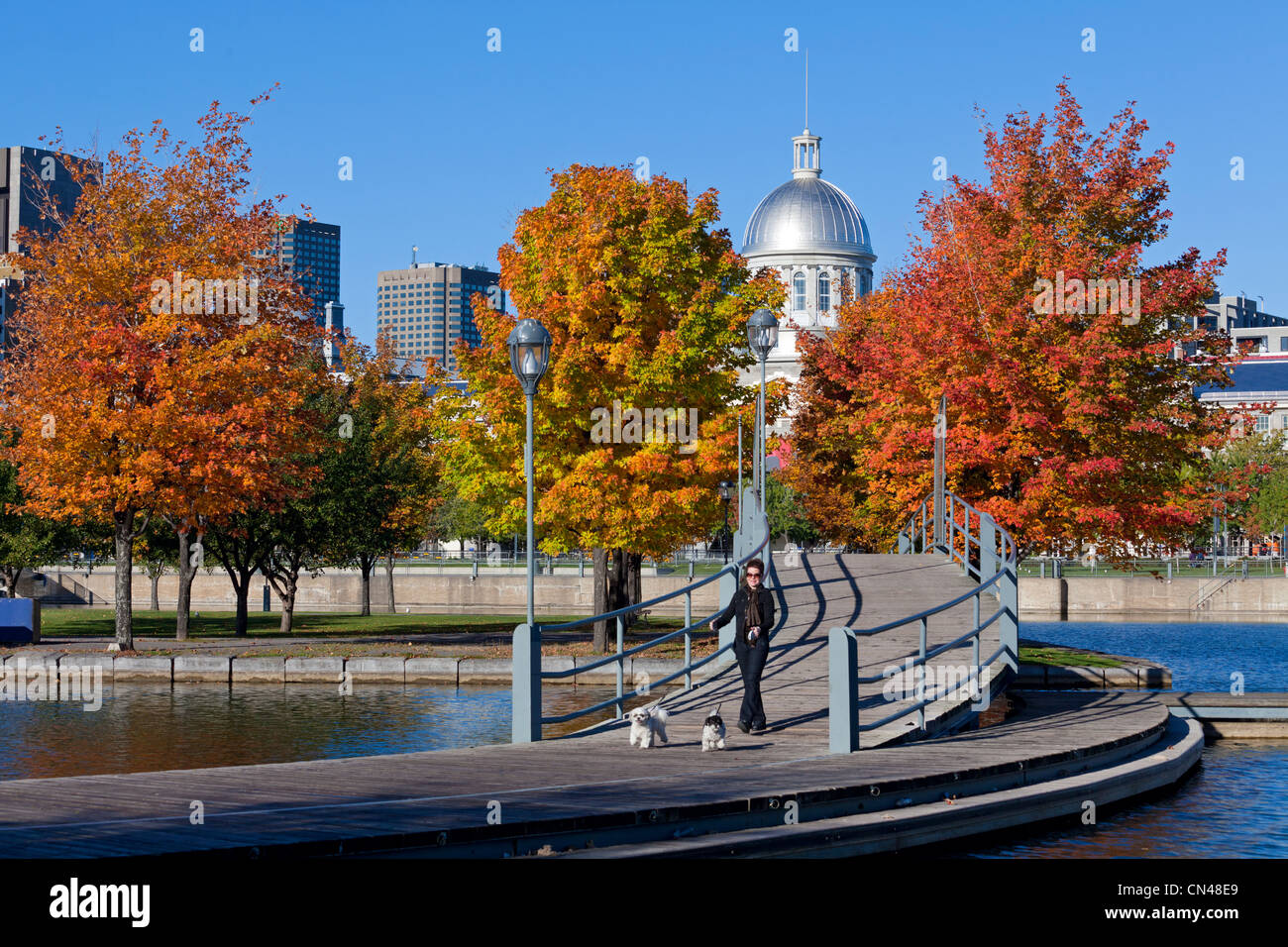 Canada, Quebec Province, Montreal, Old Montreal, Old Port, Notre Dame de Bonsecours Chapel, the colors of Autumn, woman walking Stock Photo
