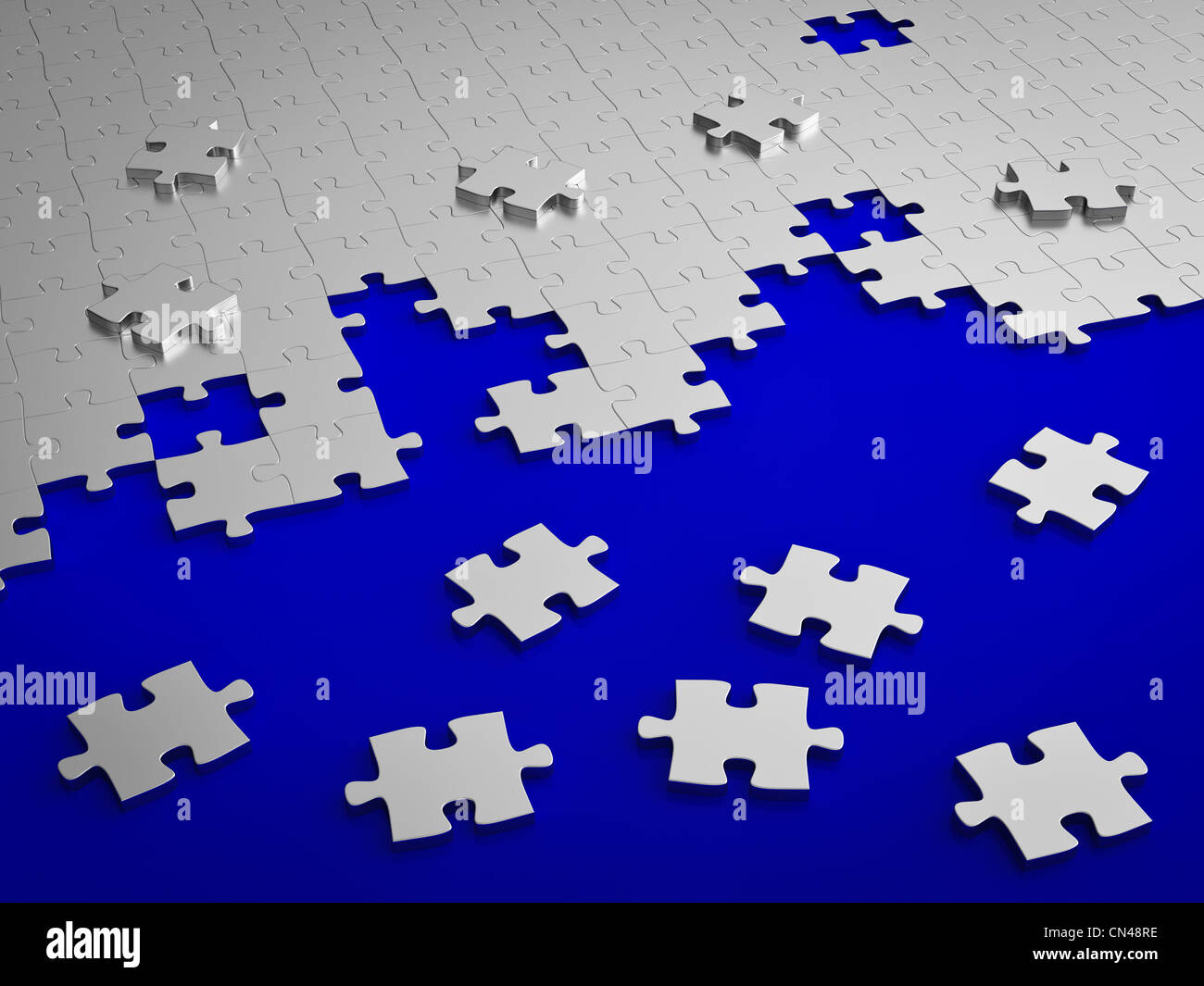 Jigsaw puzzle assemble on blue Stock Photo Alamy