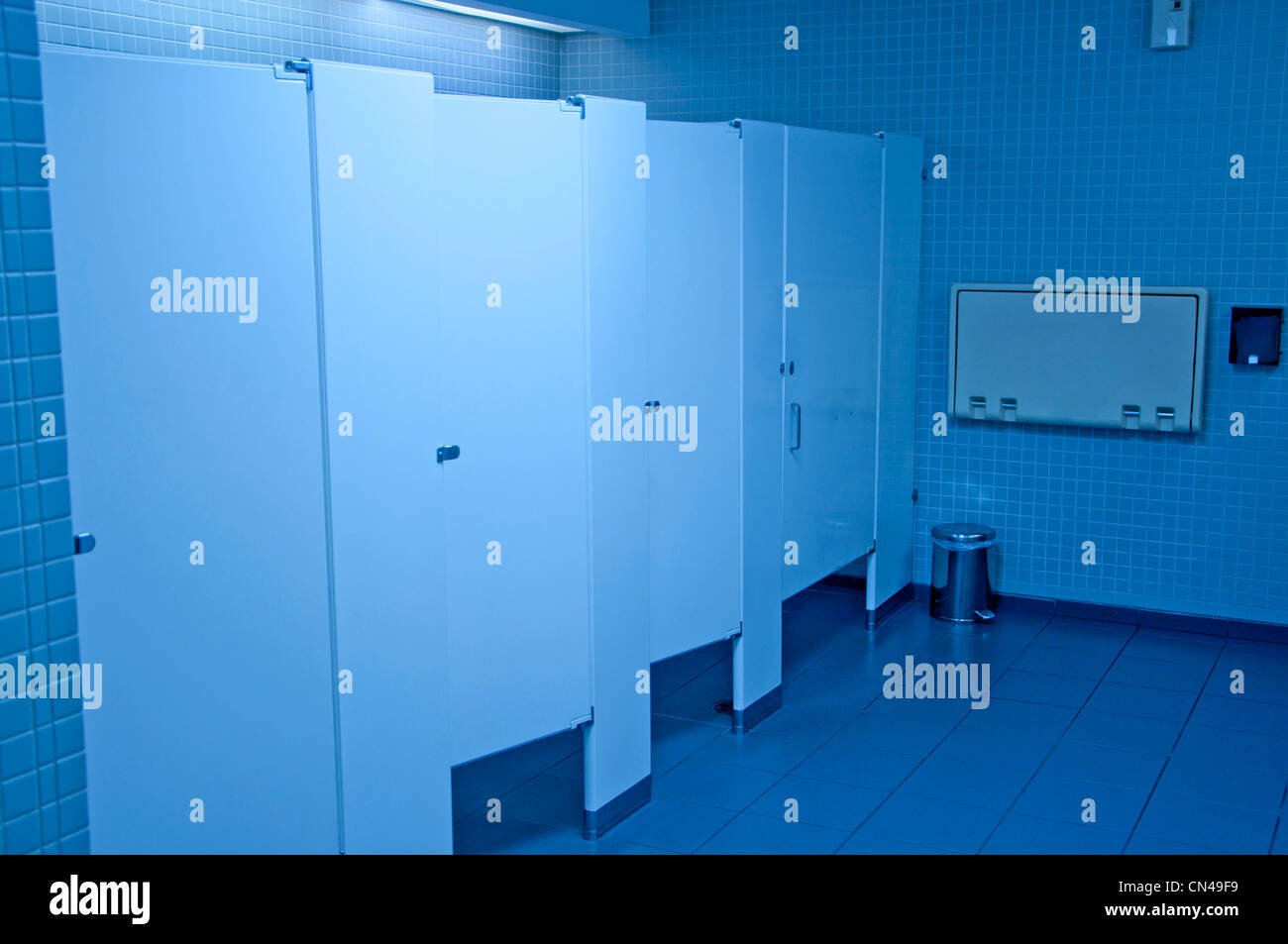 Public washroom stall with blue tone Stock Photo - Alamy
