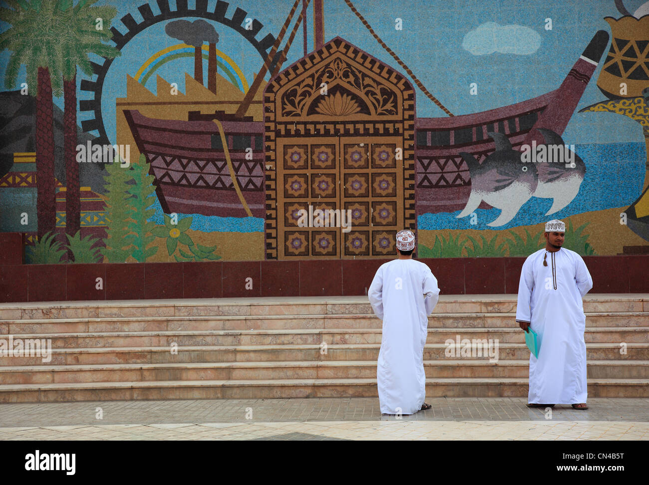 Omanische Männer in Ruwi, Uhrturmpark, Kachelbild Stock Photo